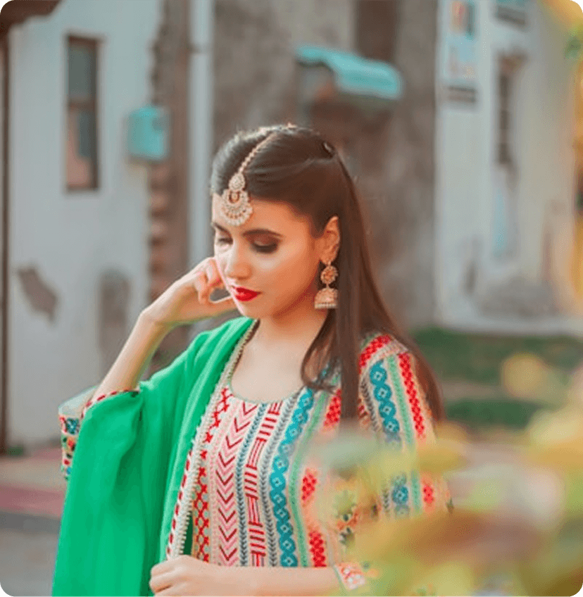 A model with a hat wearing a new arrival floral dress.